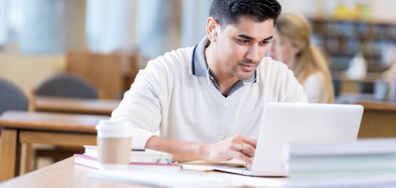 Indian student reading 2025 UK visa policy update